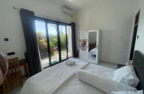 Kutuh House | Orange Guest House room
