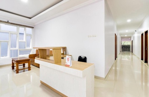 Sinduharjo Hotel | OYO 3384 Banua Raya