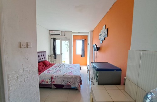 Karawang Hotel | OYO Life 93139 Apartemen Grand Sentraland By Evi
