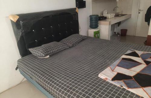 Karawang Hotel | OYO Life 93139 Apartemen Grand Sentraland By Evi