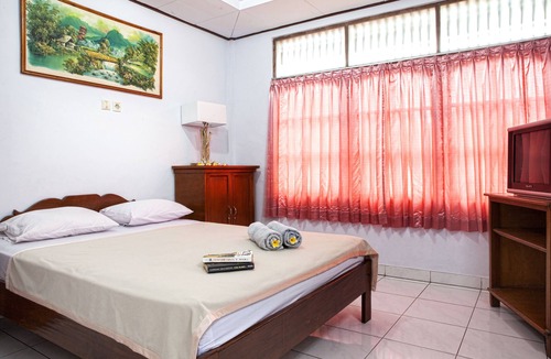 Downtown Kuta Hotel | Palm Garden Kuta Hotel