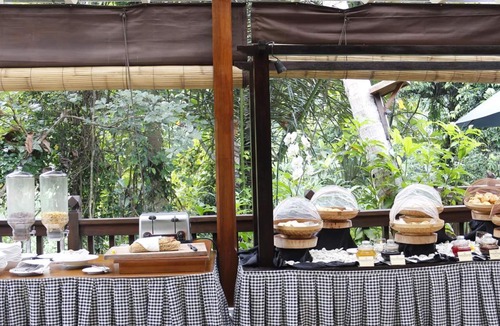 Sambahan Boat Rental | Private suite in Ubud, sleeps 2 people, surrounded by lush green surroundings