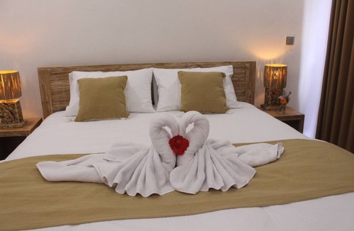 Melayang Bed & Breakfast | Separated High Quality Guest Rooms on Family Property With Tropical Garden Area