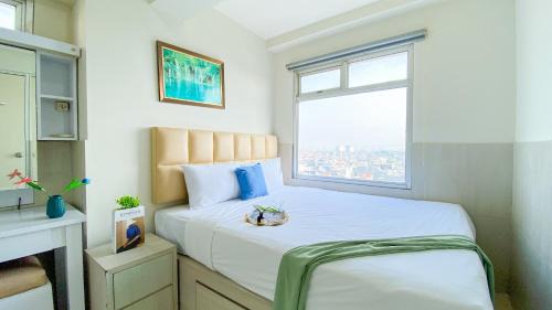 Pluit Apartment | Spacious and Homey 3BR at Green Bay Pluit Apartment By Travelio