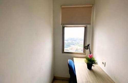 Pinang Apartment | Springwood At By LiviRooms Tangerang