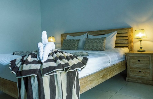 Batu Bolong Hotel | The Wina Guesthouse 2