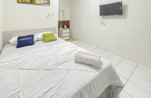 West Cirebon Hotel | Urbanview Grey CSB Mall Cirebon