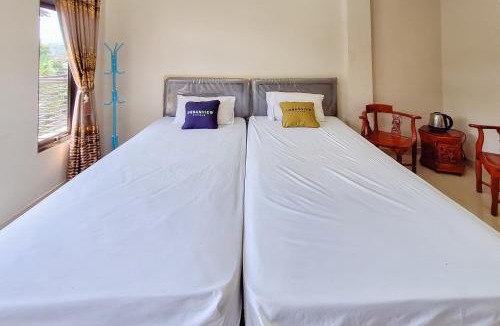 Baros Hotel | Urbanview Hotel Penginapan Ananda