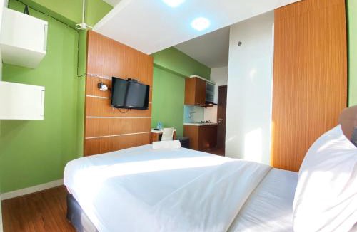 Cileunyi Apartment | Warm Studio Apartment at Harvard Jatinangor By Travelio