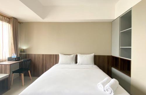 Duren Sawit Apartment | Well Furnished and Cozy Studio at Gateway Park LRT City Jatibening Apartment By Travelio