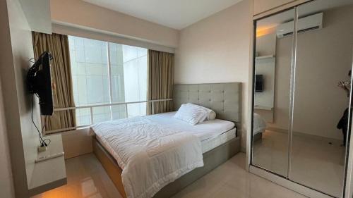 Apartemen Grand Kamala Lagoon by Choco Room in Pekayon Satu