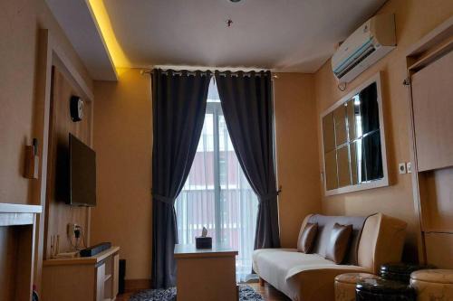 Apt Pejaten Park 1BR Brown By Damaresa in Jakarta