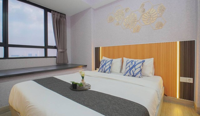 Chic And Homey Studio Room At Apartment Collins Boulevard in Tangerang