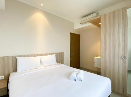 Cozy and Minimalist 2BR at 8th Floor The Oasis Cikarang Apartment By Travelio in Cikarang