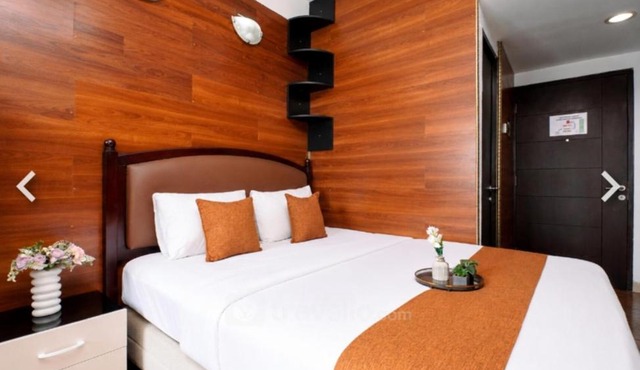 Grand Dhika Apartement by 2325 Studio room with cozy wooden style room in Bekasi