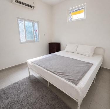 Guesthouse walking distance to Beach with share kitchen