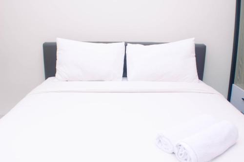 Homey and Minimalist Studio at Vasanta Innopark Apartment By Travelio in Cikarang