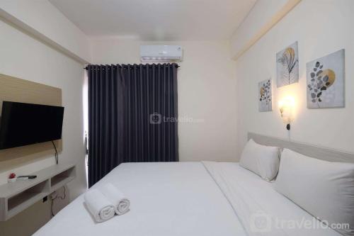 Homey Studio at Bogorienze Apartment near The Jungle Waterpark By Travelio in Bogor