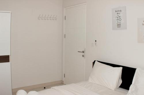 Minimalist and Comfort 2BR at Springlake Summarecon Bekasi Apartment By Travelio in Bekasi