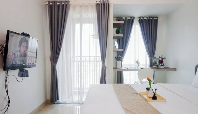 Minimalist And Restful Studio Room At Apartment Grand Dhika City in Bekasi