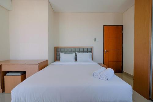 Modern and Cozy 2BR Royal Olive Apartment By Travelio in Jakarta