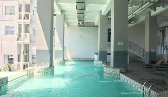 Modern and Cozy Studio Room at Easton Park Residence near UNPAD By Travelio in Sumedang