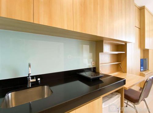 Modern Design and Homey Studio Ciputra World 2 Apartment By Travelio