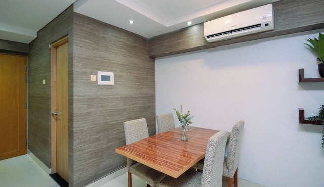 Restful And Roomy Loft 2Br At Apartment Maqna Residence