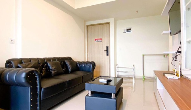 Spacious and Comfy 2BR with Extra Room at Meikarta Apartment By Travelio in Cikarang