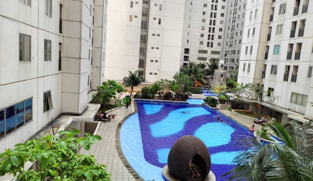 Toptravel Bassura City