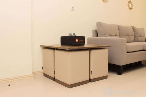 Warm and Cozy Living 3BR at Meikarta Apartment By Travelio in Cikarang