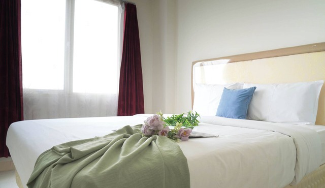 White Tone 2Br At Podomoro Golf View Apartment in Gunung Putri