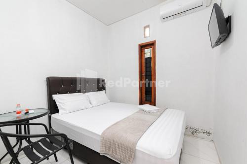Wisma Radya Syariah RedPartner in Serang