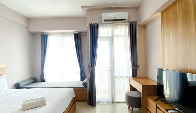 Wonderful And Homey Studio Vasanta Innopark Apartment in Cikarang