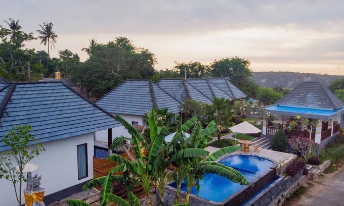 Penida Island Cottage | WK Gamat Garden by WizZeLa ( Deluxe Room )