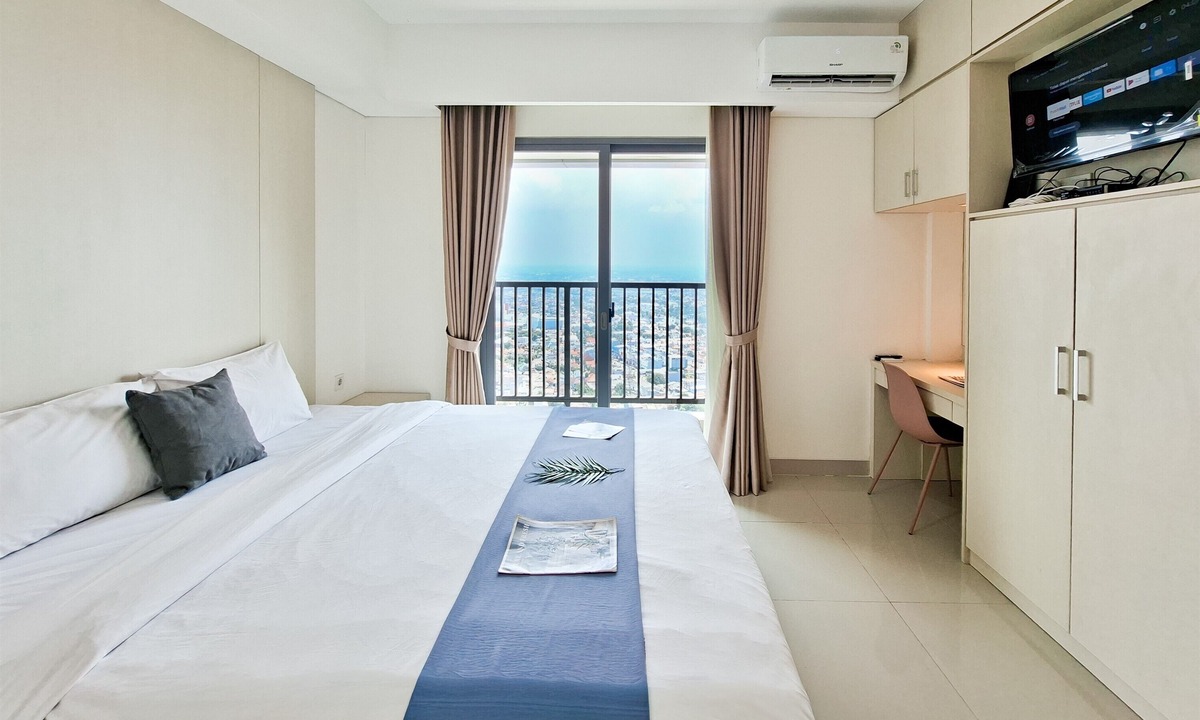 Pondok Aren Apartment | Wooden Accents 1Br Without Living Room At Bintaro Embarcadero Apartment