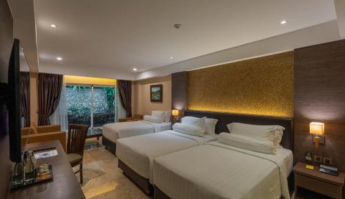 Deluxe Family Twin Room, with FREE daily shuttle to Ubud City, FREE Photo Session, FREE Art Gallery Visit, 24-hour access to Fitness Center, FREE Welcome Drink, and FREE Kids Activities.