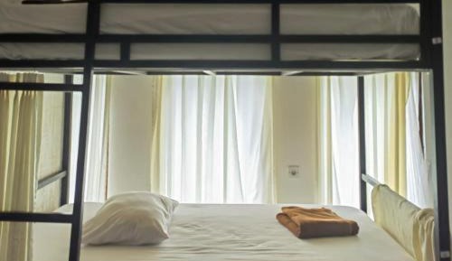 Single Bed in Dormitory Room
