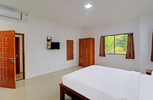 By Pass Ngurah Rai Hotel | Capital O 92039 Runways House
