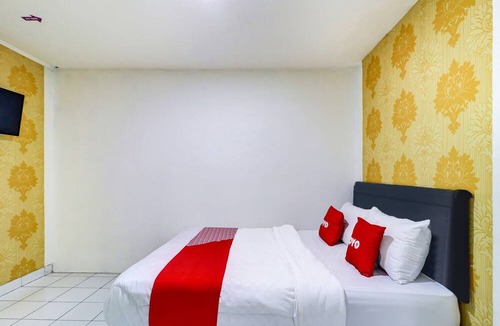 Ngamprah Hotel | OYO 90873 Orchid Guesthouse