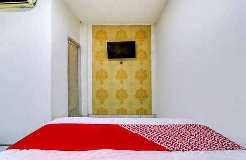 Ngamprah Hotel | OYO 90873 Orchid Guesthouse