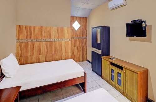 Melaya Hotel | SPOT ON 92028 Hotel Surya Near Pelabuhan Gilimanuk