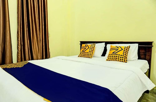 Karya Penggawa Hotel | SPOT ON 92392 Penginapan Vinccent22 Syariah