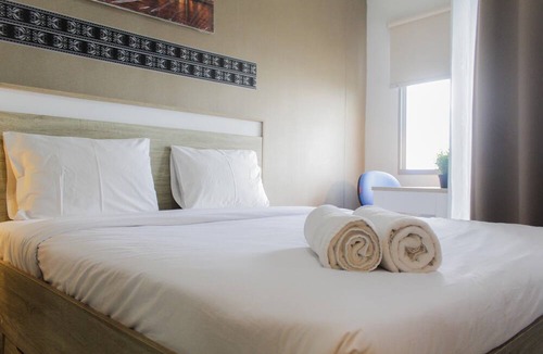 Panunggangan Utara Apartment | Bright Studio Apartment at Springwood Residence
