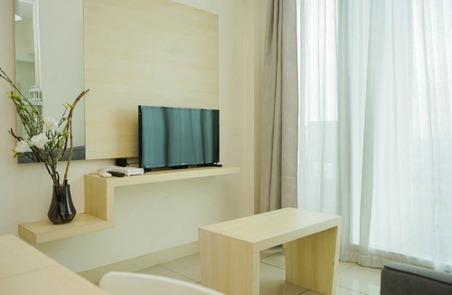 Cikokol Apartment | Comfy and Tidy 1BR Apartment at Tree Park City BSD