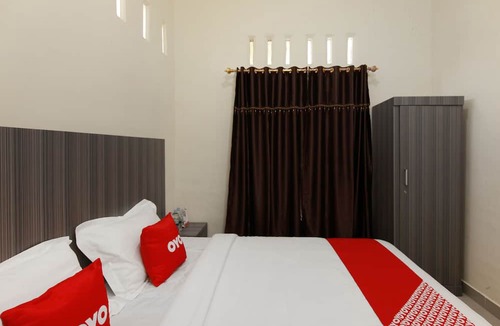 Ambarita Hotel | OYO 1694 Pariban Homestay