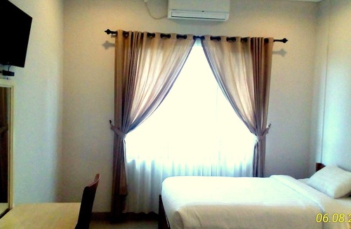 Mengwi Hotel | Dhyanapura City Hotel