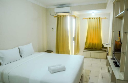 Panunggangan Utara Apartment | Simply Studio Room at Grand Serpong Apartment By Travelio