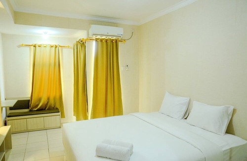 Panunggangan Utara Apartment | Modern Studio Grand Serpong Apartment By Travelio