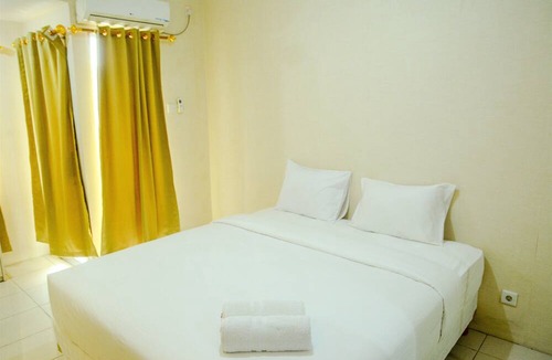 Panunggangan Utara Apartment | Modern Studio Grand Serpong Apartment By Travelio